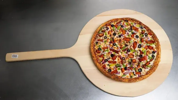 Infinity Pizza signature Punjabi-style pizzas in NE Calgary